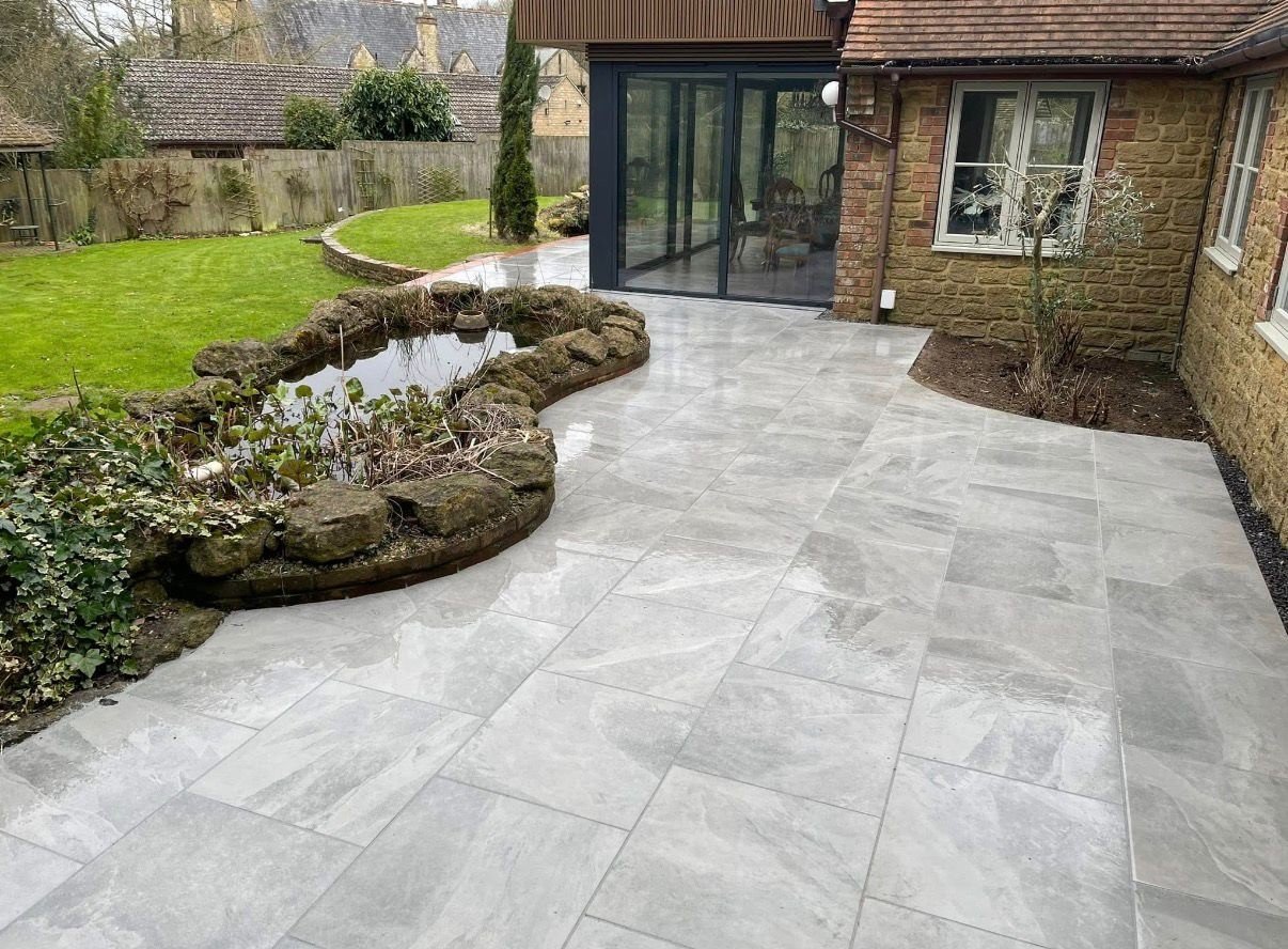 Porcelain patio & pond by P.A. Vine & Son, Yeovil, Somerset